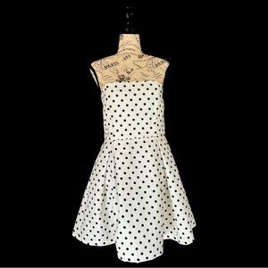 Black and white polka dots strapless dress.